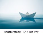 Paper Boat Sailing On Water...