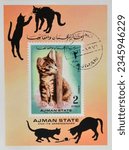 Small photo of Ajman - circa 1971 : Cancelled postage stamp printed by Ajman, that shows Cat, circa 1971.