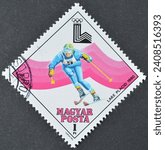Small photo of HUNGARY - CIRCA 1979 : Cancelled postage stamp printed by Hungary, that shows Downhill Skiing, Winter Olympic Games 1980 - Lake Placid, circa 1979.