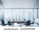 Small photo of Light blurred background. Blur Modern contemporary office and meeting room,interior design. with panoramic windows and a perspective.