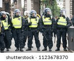 Small photo of London, UK. 9th June 2018. EDITORIAL - Riot police cordon off a street for public safety during a rally held by supporters of ex EDL leader Tommy Robinson, at Downing Street, Whitehall, London, UK.