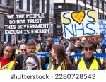 Small photo of London, UK. 11th March 2023. Protesters at the SOS NHS National Demo in central London, supporting striking healthcare workers and in protest of the crisis caused by government cuts and mismanagement