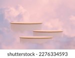 Surreal podium outdoor on blue sky pink violet pastel soft clouds with space.Beauty cosmetic product placement pedestal present stand minimal display,summer paradise dreamy concept.