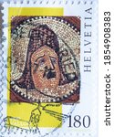 Small photo of Switzerland - Circa 1997 : a postage stamp printed in the swiss showing aa mosaic "Ariadne and Bacchus" Gallo-roman museum of Vallon