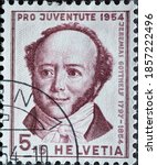 Small photo of Switzerland - Circa 1954 : a postage stamp printed in the swiss showing a portrait of the writer and pastor Jeremias Gotthelf (pseudonym for Albert Bitzius)