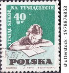 Small photo of POLAND-CIRCA 1959 : A post stamp printed in Poland showing creating a school girl doing homework. The 1000 Schools for the 1000th Anniversary of Poland