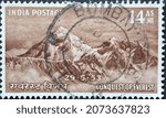 Small photo of India - circa 1953: a postage stamp from India showing the Mount Everest. conquest of everest
