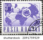 Small photo of Romania - circa 1968: A post stamp printed in Romania showing a World Map with Telex