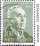 Small photo of Netherlands - circa 1954: a postage stamp from the Netherlands , showing a portrait of Johan Huizinga (1872-1945) historian