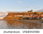Whitby Harbour With The Church...