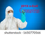 Small photo of scientist in safety suit drawing word 2010 ncos coronavirus