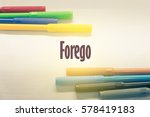 Small photo of Forego - Abstract hand writing word to represent the meaning of word as concept. The word Forego is a part of Action Vocabulary Words in stock photo.