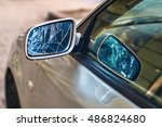 Car with broken side door mirror