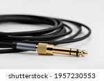 Braided flexible speaker cable with electronics plug, copy space.
braid
