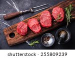 Raw fresh marbled meat Steak and seasonings on dark marble background