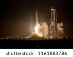 Small photo of Wallops Island, Virginia - May 21, 2018 The Orbital ATK Antares rocket launches on the CRS OA-9E mission to resupply the ISS.