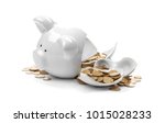 stock-photo-broken-piggy-bank-with-money