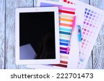 tablet  pen and paper on wooden ... | Shutterstock . vector #222701473