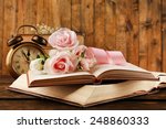 Books With Flowers And Clock On ...