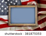 Wooden Frame On American Flag...
