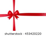 red ribbon with bow knot on... | Shutterstock . vector #453420220