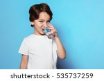 Cute little boy drinking water...
