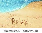 Word Relax On Beach Sand