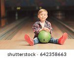 Cute Child With Ball In Bowling ...
