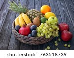 Basket and fresh fruits on...