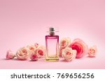 Bottle of perfume with flowers...