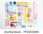 Composition with sewing threads and accessories on white background, top view