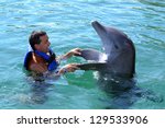 Happy Man Swim With Dolphin In...