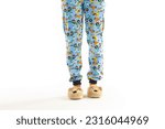 Boy in pajama. White background. Legs detail. Night wear