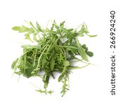 Small photo of Pile of eruca sativa rucola arugula fresh green rocket salad leaves, composition isolated over the white background