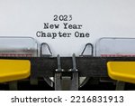 Old typewriter with text 2023 New Year Chapter One	
