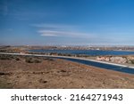 Panoramic image taken from Lamont Odette Vista Point of the California aqueduct at Palmdale in Los Angeles County shown on a windy day.