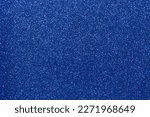 Abstract background filled with shiny dark blue glitter