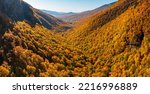Small photo of Aerial panorama of Smugglers Notch looking towards Stowe in fall colors