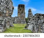 Small photo of Scenic view with remains of destroyed colonial medieval church in Panama Viejo. Old ruins of stone-wall buildings in tropics. Tourist attraction under protection of UNESCO World heritage in Panama.
