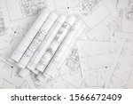 Paper architectural drawings and blueprint