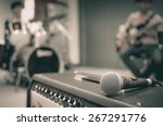 Closeup of microphone on musician blurred background