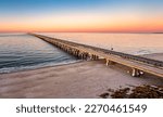 Small photo of Aerial panorama of Chesapeake Bay Bridge Tunnel at sunset. CBBT is a 17.6-mile bridge tunnel that crosses the mouth of the Chesapeake Bay.