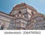 Cathedral of Santa Maria del Fiore, Brunelleschi's dome in Florence with blue sky                