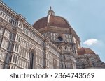 Cathedral of Santa Maria del Fiore, Brunelleschi's dome in Florence with blue sky               