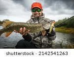 Fisherman And Trophy Pike....