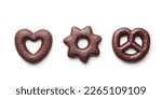 Small photo of Sweet chocolate heart, star and pretzel isolated on the white background.