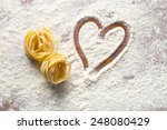 top view of heart and pasta