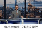 Small photo of Bearded anchor man talking at newscast modern multimedia channel closeup. Confident newsreader covering daily news in television studio. Serious newscaster reporting business information in air