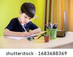 boy using laptop while doing... | Shutterstock . vector #1683688369