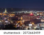 Small photo of DUBUQUE, IOWA - OCTOBER 2021 - A Nighttime Shot of Downtown Dubuque and Highway 61 Traffic